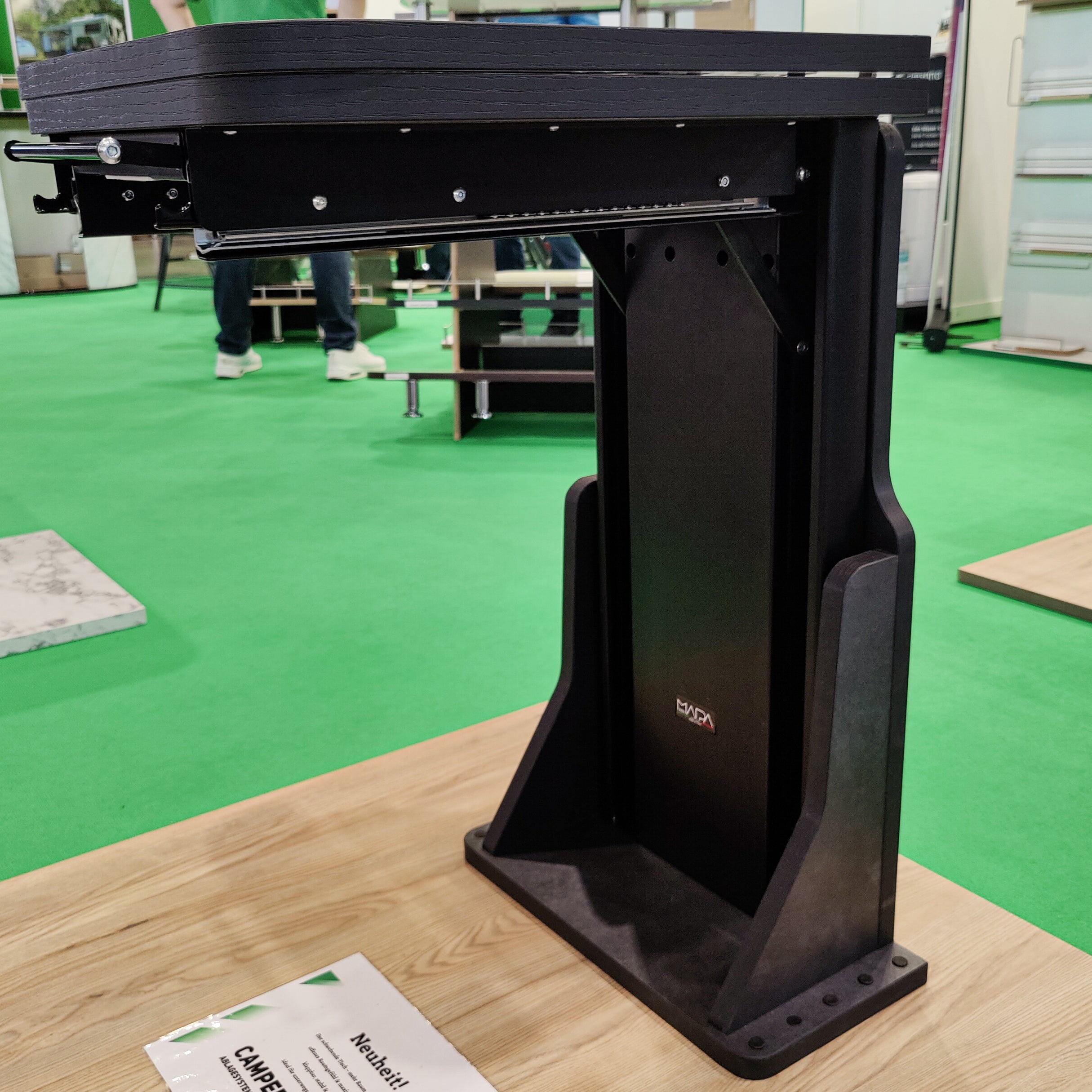 Floating table for panel vans and campervans