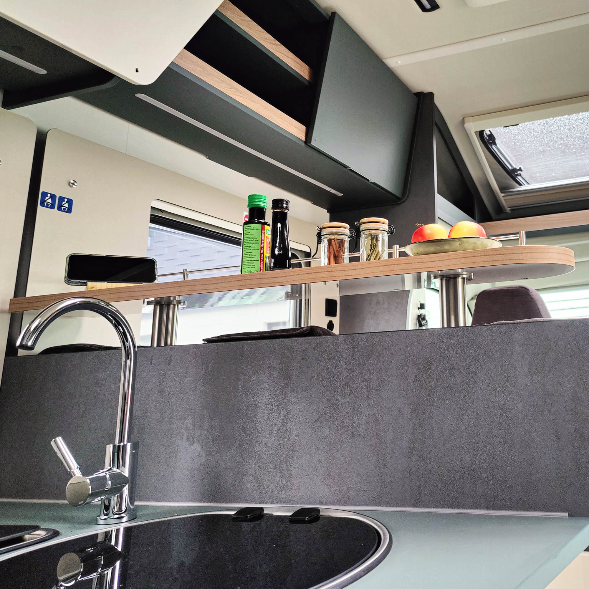 Laika storage board with railing for motorhome kitchen