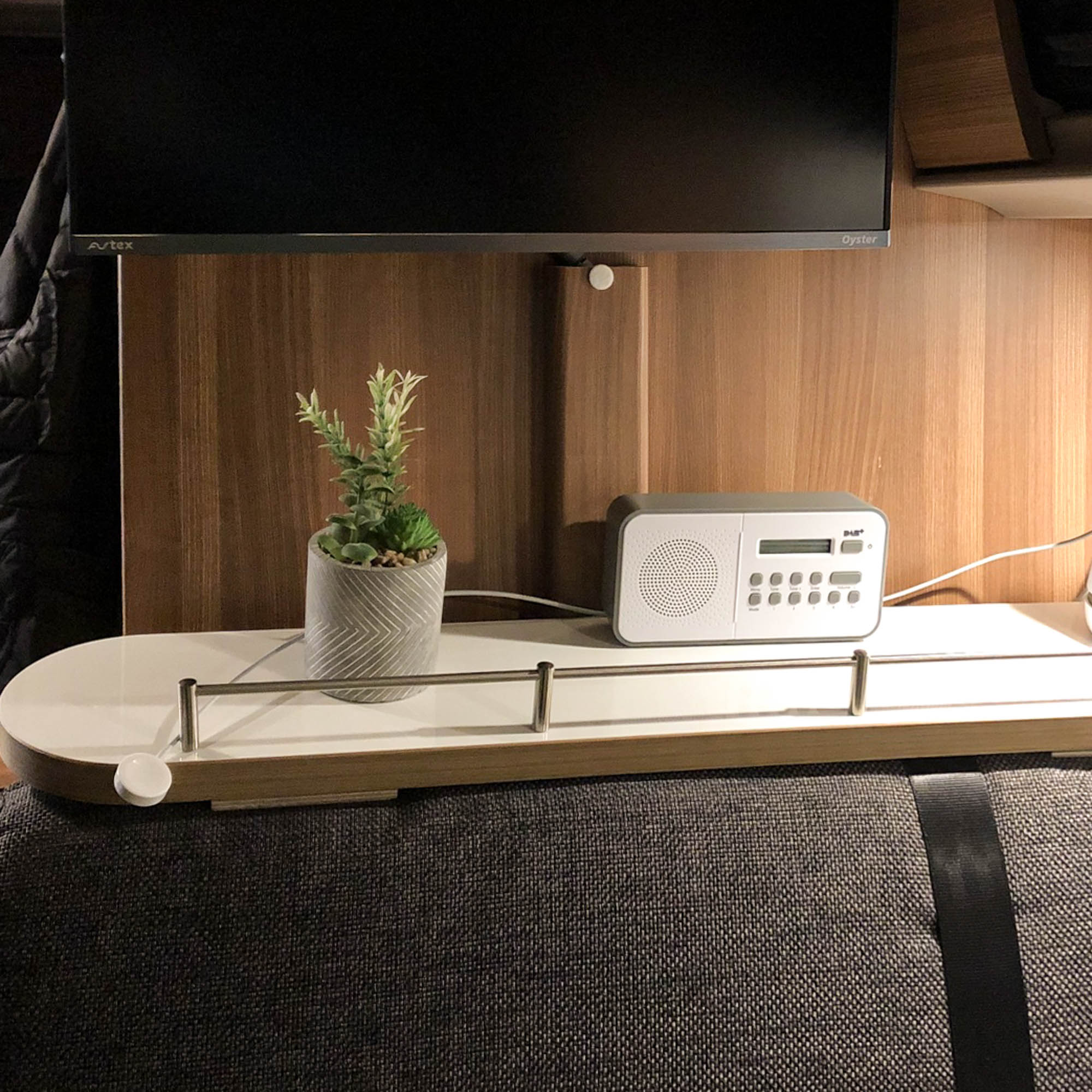 Storage shelf for decoration and radio in the Knaus