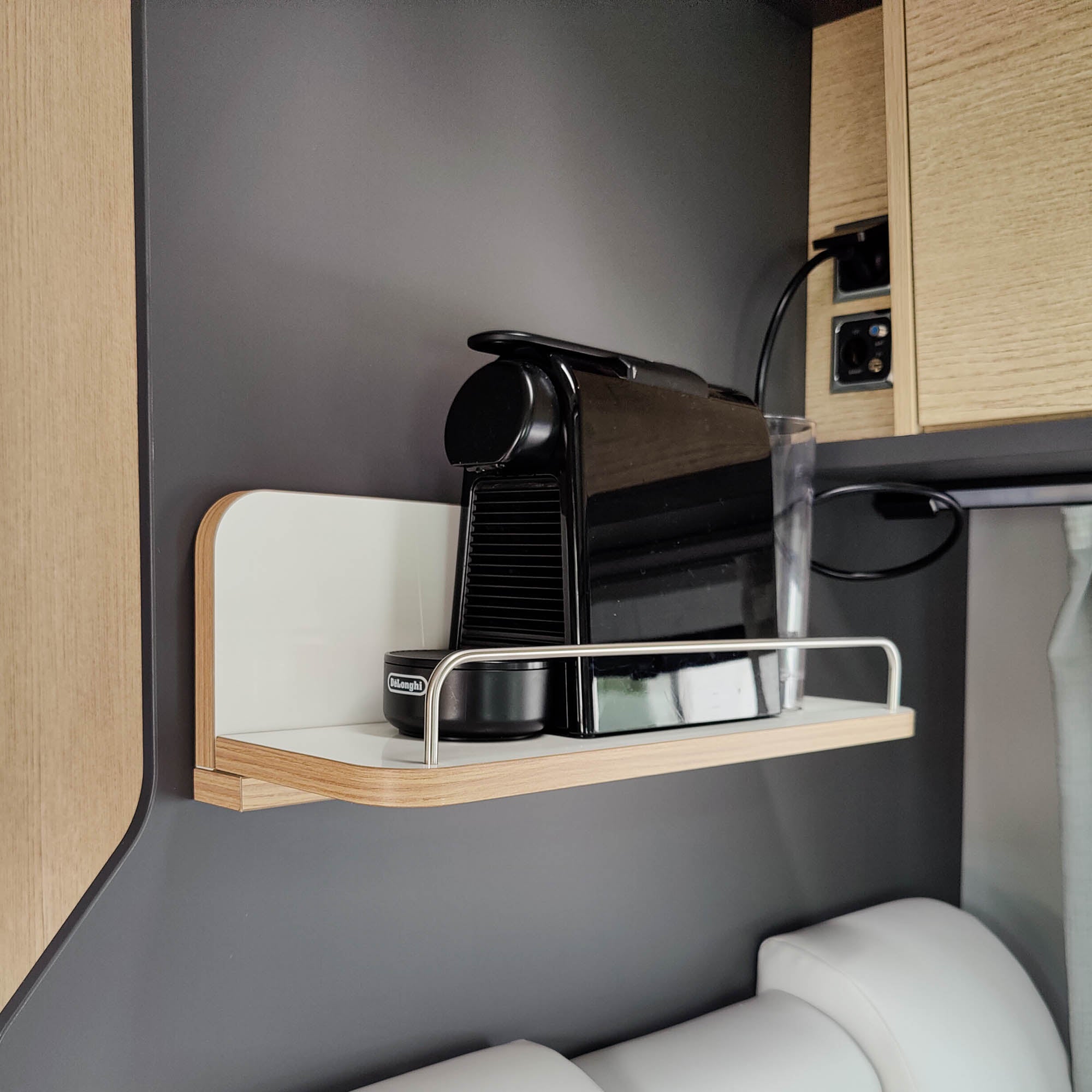 Plug-in motorhome shelf with railing