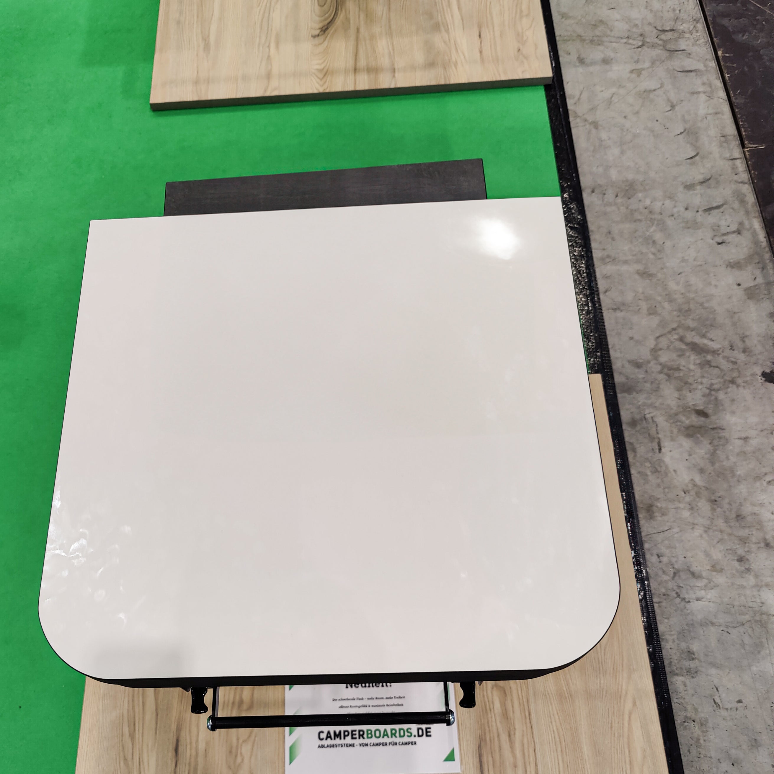 Floating table for panel vans and campervans